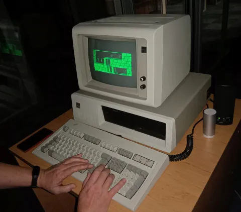High-end gaming PC setup with RGB lighting and mechanical keyboard