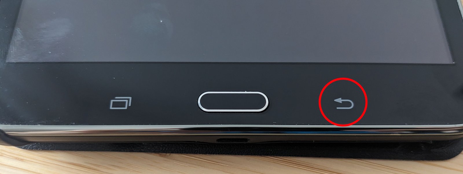 A modern Samsung Galaxy tablet with a stylus on a clean desk.