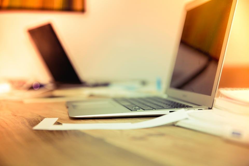 MacBook laptop on a clean desk workspace