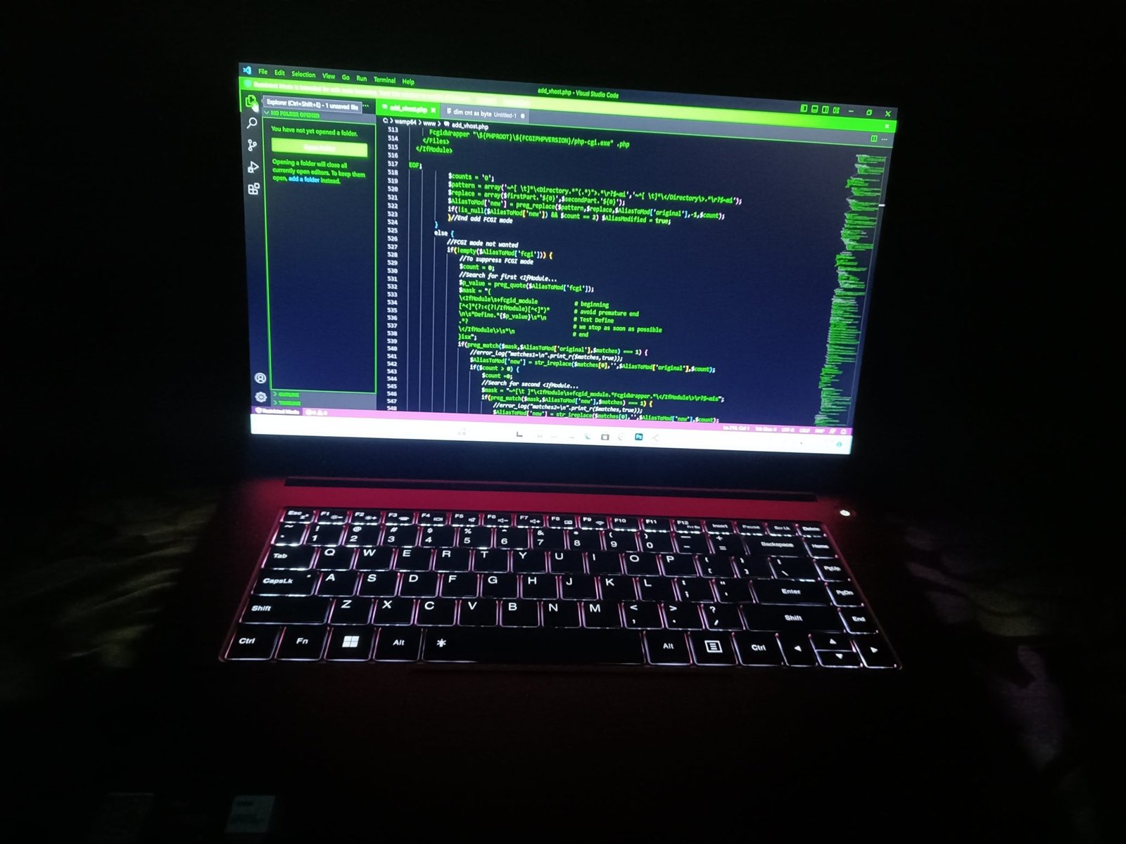 Laptop showing performance graph on screen.