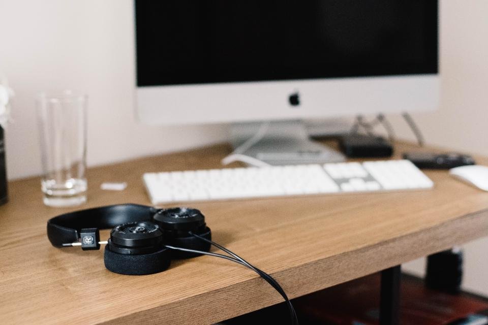 Computer keyboard and desk setup for office productivity