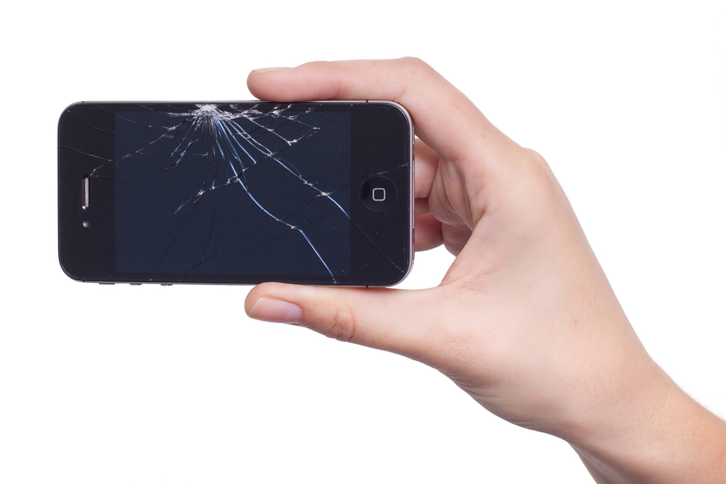 Person uploading a photo to an AI app on a smartphone
