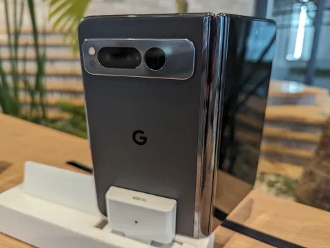 A modern Google Pixel smartphone displaying a customized home screen with widgets and app icons.