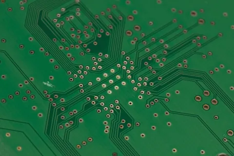 Technician diagnosing a computer to fix freezing issues.