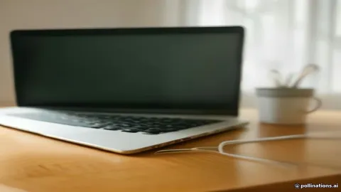 جهاز لوحي متصل بحاسوب لإعادة ضبط رمز القفل واستعادة النظام